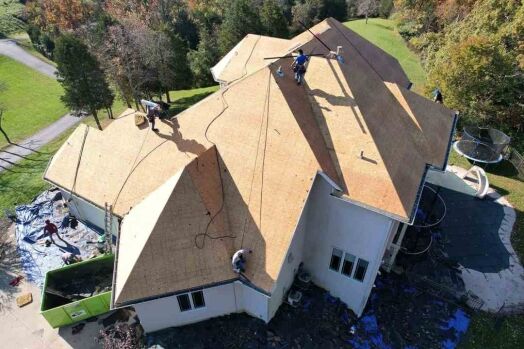 The Southwest Ohio Roof Defense team is hard at work in this photo, providing top-notch roofing services to a homeowner in Cincinnati. Their commitment to excellence is evident in every project they take on